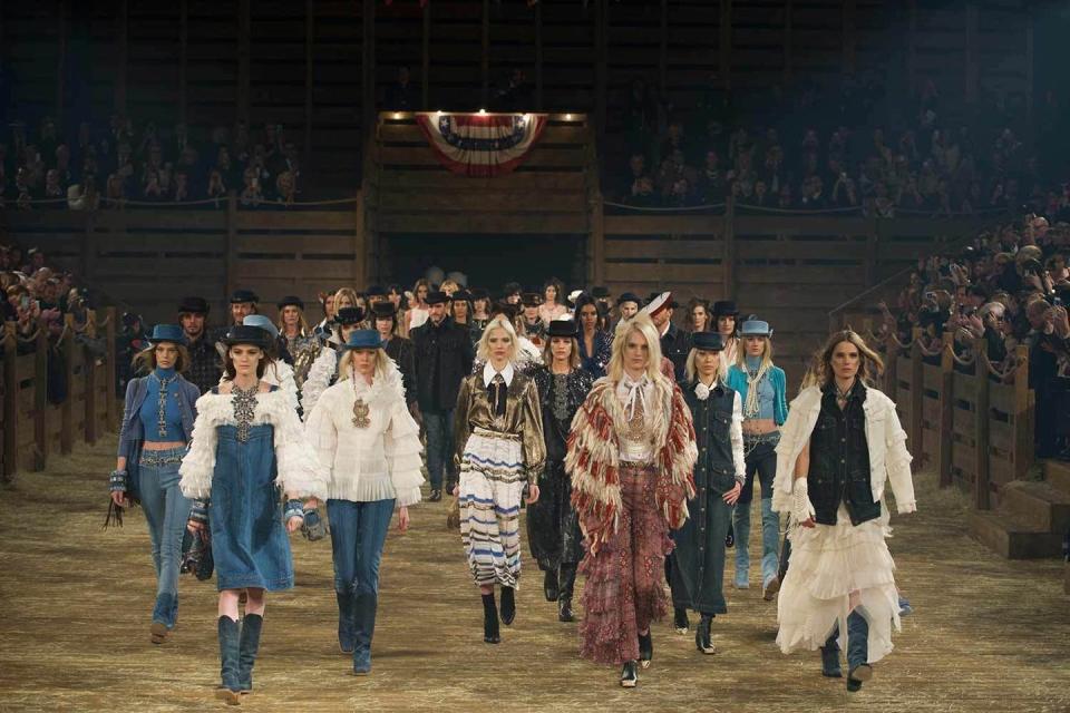 <p>Welcome to Dallas, Texas for the Chanel Metiers D'Art show. There's rodeos and then there are Chanel rodeos: flags bearing the red, white and blue, models decked out in cowboy hats and boots and a finale stampede that could have passed as the Pamplona. </p>