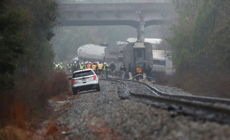 Emergency responders are at the scene after an Amtrak passenger train collided with a freight train and derailed in Cayce, South Carolina, U.S., February 4, 2018. REUTERS/Randall Hill