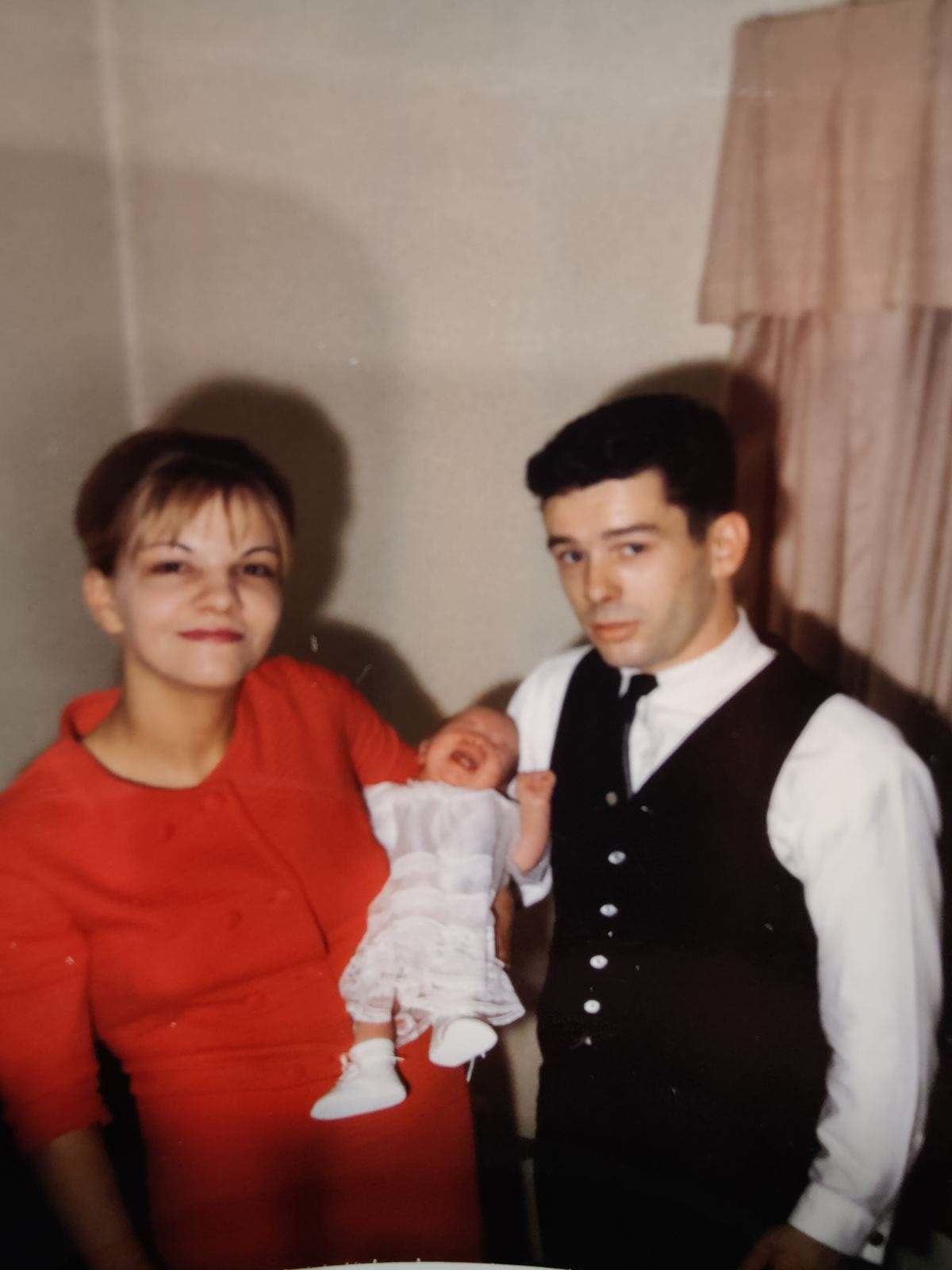 Karen and Paul Snider with their baby daughter, Paula, who was at today's court hearing for her mother's alleged killer.  / Credit: Snider family