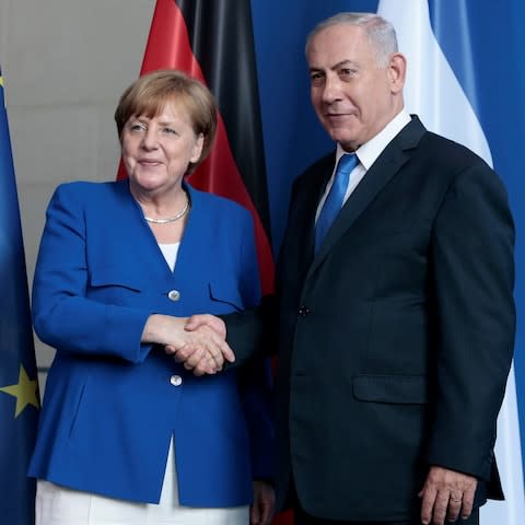 German Chancellor Angela Merkel and Israeli Prime Minister Benjamin Netanyahu joint press conference in Berlin - Credit: Getty