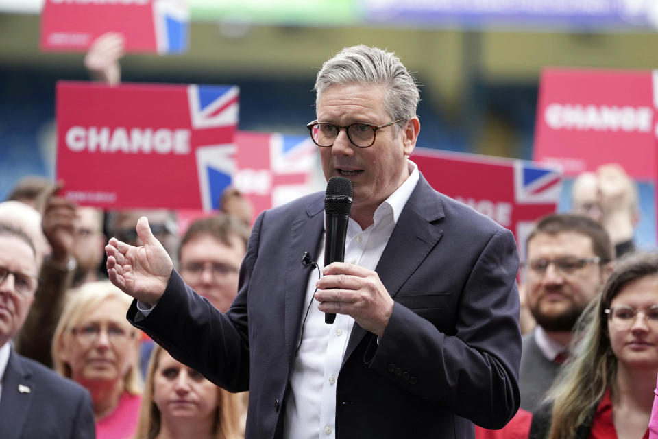 Britain's Labour Party leader Keir Starmer speaks during a visit to Gillingham Football club in Gillingham, Kent, England, Thursday May 23, 2024, while on the General Election campaign trail. Britain’s political party leaders were crisscrossing the country on Thursday, the first day of a six-week election campaign in which voters will decide whether to end the governing Conservatives’ 14 years in power. (Gareth Fuller/PA via AP)