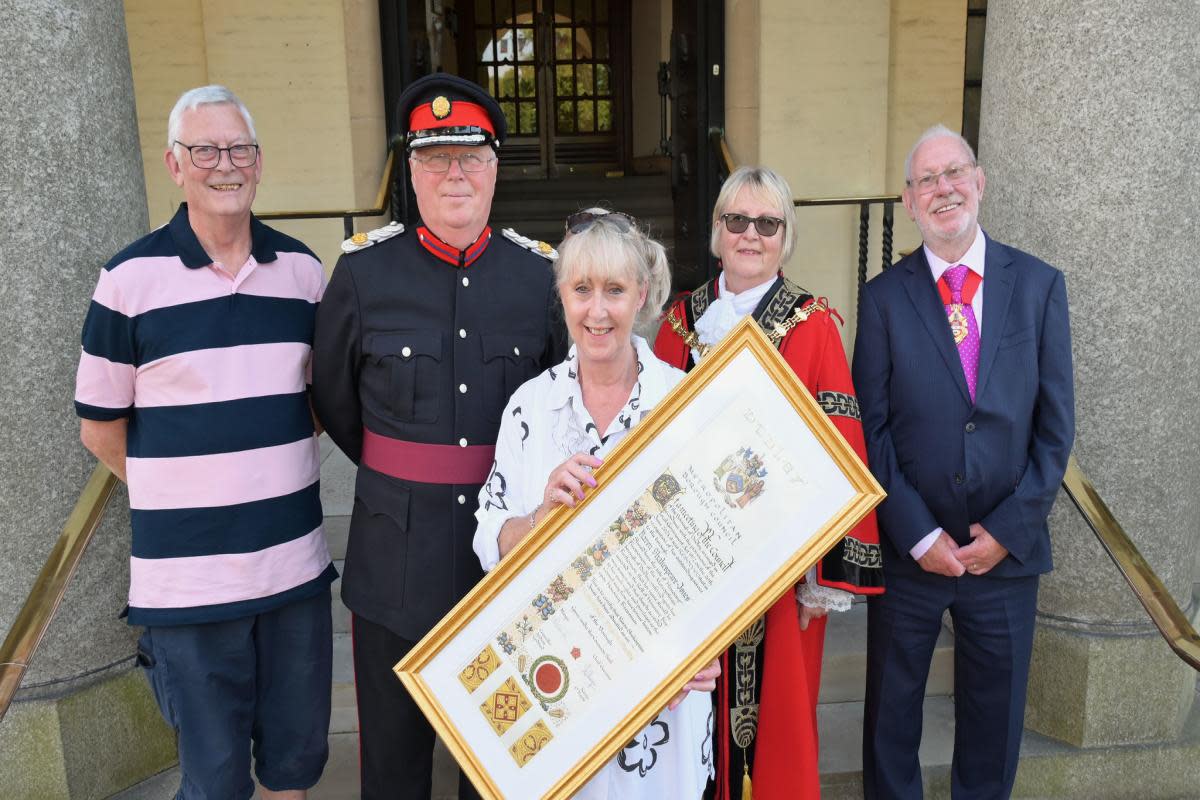 Former councillor Karen Shakespeare receives Freedom of Dudley borough with l-r husband and fellow Freeman Les Jones, Deputy Lieutenant Richard Boot, Mayor of Dudley and Mayoral Consort <i>(Image: Dudley Council)</i>