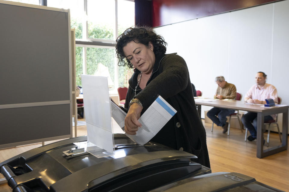 Lawmaker Caroline van der Plas, leader of the populist BBB Farmer Citizen Movement casts her vote for the provincial elections in Okkenbroek, eastern Netherlands, Wednesday, March 15, 2023. Local elections with national consequences opened Wednesday in the Netherlands as voters cast their ballots for the country's 12 provincial legislatures, which in turn elect the national parliament's upper house. (AP Photo/Peter Dejong)