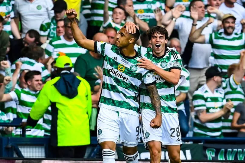 Celtic's Adam Idah celebrates with Paulo Bernardo