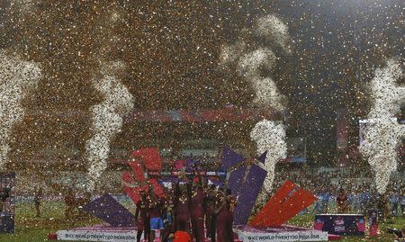 Cricket - England v West Indies - World Twenty20 cricket tournament final - Kolkata, India - 03/04/2016. West Indies players celebrate with the trophy after winning the final. REUTERS/Adnan Abidi