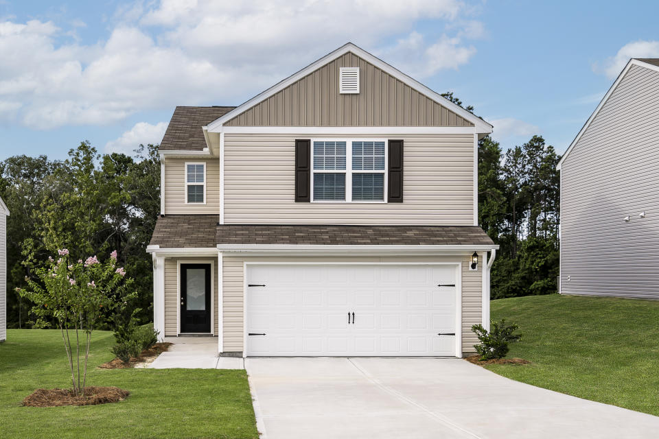 The three-bedroom, two-and-a-half-bath Ashley showcases a fully loaded kitchen with stainless steel appliances, granite countertops and 36” upper cabinets with hardware.