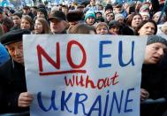 People take part in a rally ahead of the so-called "Normandy" format summit, in Kiev