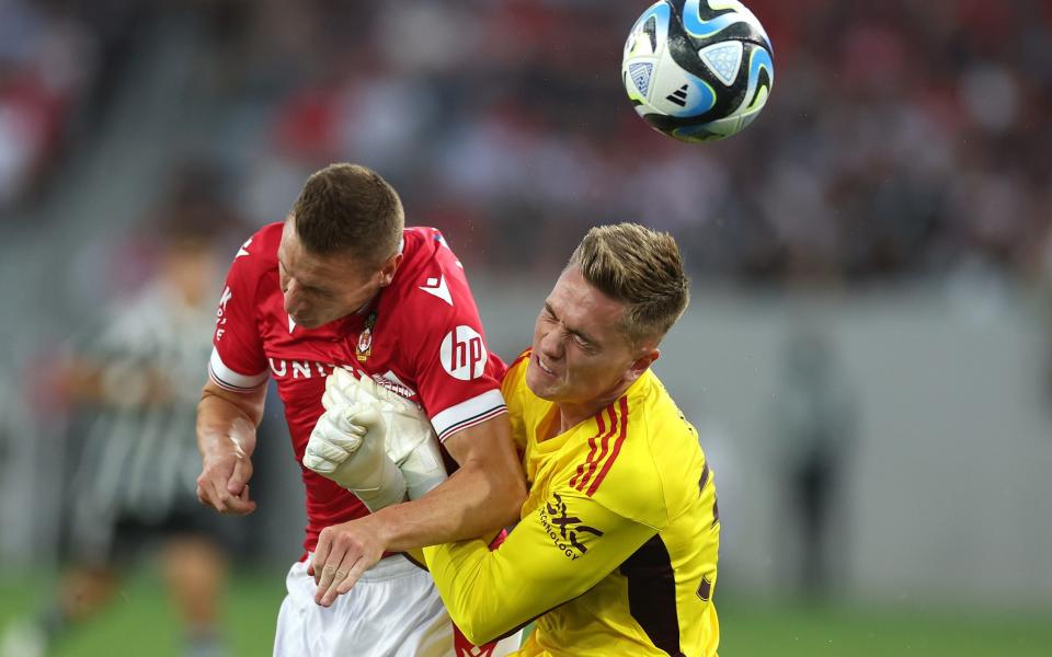 Bishop collides with Mullin during the pre-season friendly in San Diego - Wrexham fury after Manchester United goalkeeper punctures lung of star striker