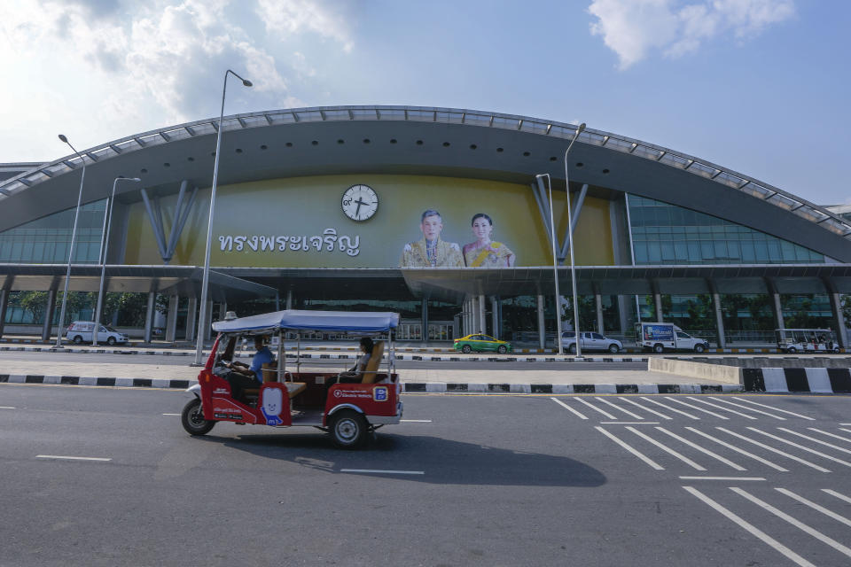 A Tuk Tuk drives past the massive Krung Thep Aphiwat Central Terminal in Bangkok, Thailand, Tuesday, Jan. 17, 2023. Thailand ushered in a new age of train travel on Thursday, Jan. 19, 2023, when what’s said to be Southeast Asia’s biggest railway station officially began operations. (AP Photo/Sakchai Lalit)