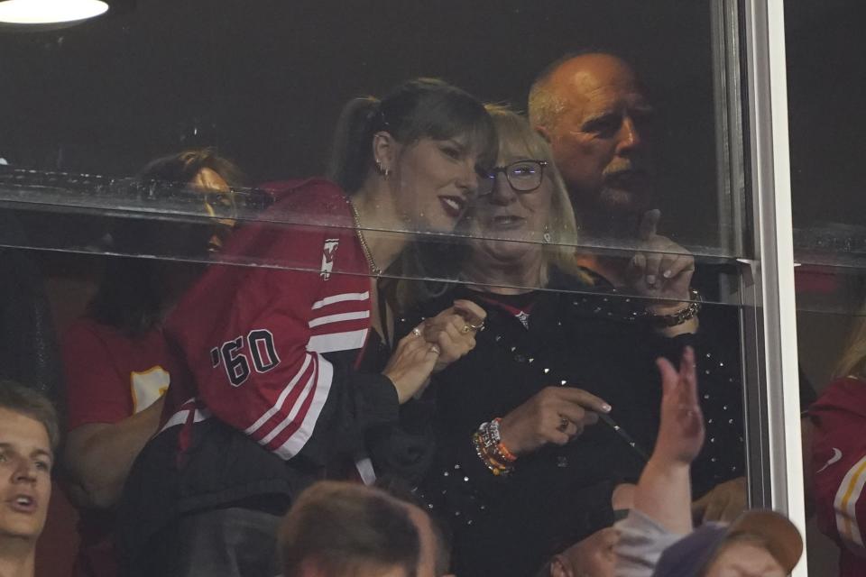 Taylor Swift and Donna Kelce talk during the first half of an NFL football game between the Kansas City Chiefs and the Denver Broncos, Thursday, Oct. 12, 2023, in Kansas City, Mo. | Ed Zurga, Associated Press