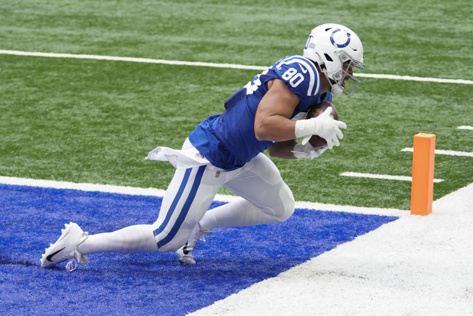 Indianapolis Colts' Trey Burton (80) makes a touchdown reception during the first half of an NFL football game against the Cincinnati Bengals, Sunday, Oct. 18, 2020, in Indianapolis. (AP Photo/AJ Mast)