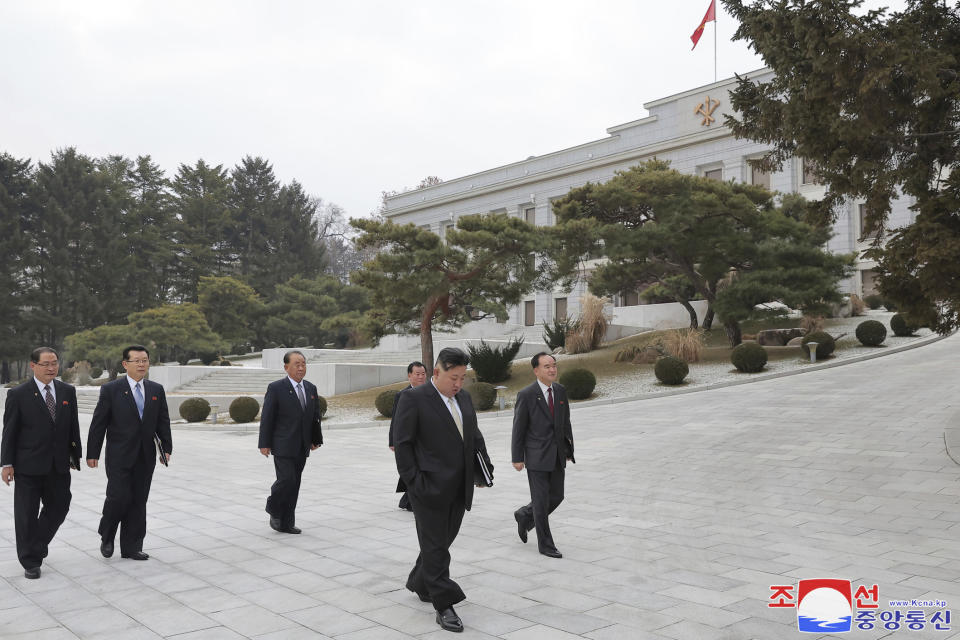 In this photo provided by the North Korean government, North Korean leader Kim Jong Un, second right, arrives for a year-end plenary meeting of the ruling Workers’ Party in Pyongyang, North Korea, Tuesday, Dec. 26, 2023. Independent journalists were not given access to cover the event depicted in this image distributed by the North Korean government. The content of this image is as provided and cannot be independently verified. Korean language watermark on image as provided by source reads: "KCNA" which is the abbreviation for Korean Central News Agency. (Korean Central News Agency/Korea News Service via AP)