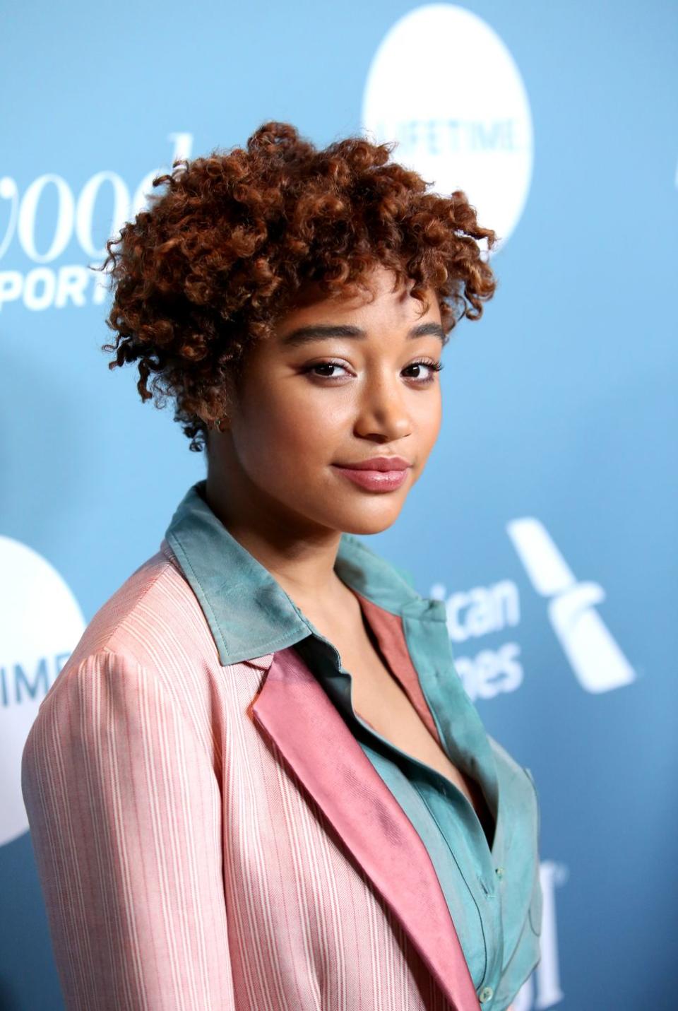 <p>Amandla looks gorgeous with orangey corkscrews. Zendaya also rocked this exact same color at last year's Met Gala, so it's safe to say this shade is trending. </p>