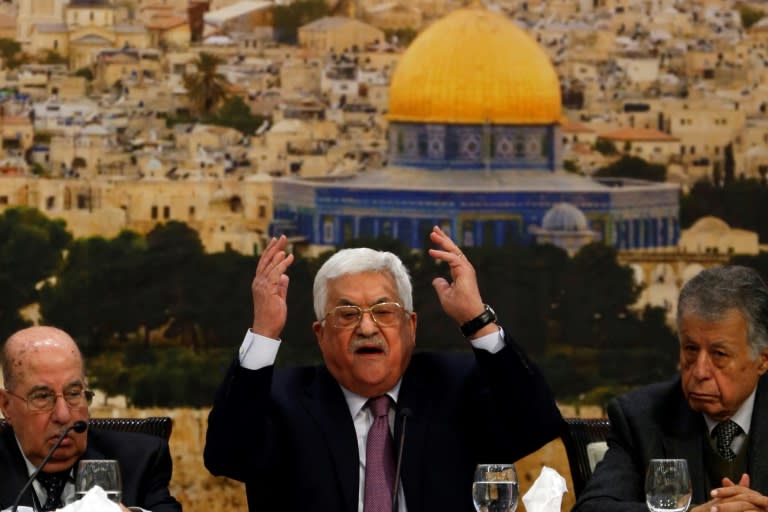 Palestinian president Mahmoud Abbas (C) speaks during a meeting in the West Bank city of Ramallah on January 14, 2018