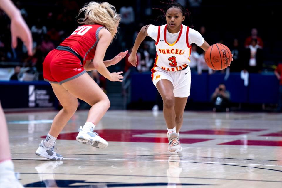 Purcell Marian guard Ky'Aira Miller (3) became the fourth Cavalier in program history to record a triple-double when she had 17 points, 13 rebounds and 10 assists against Norwood.