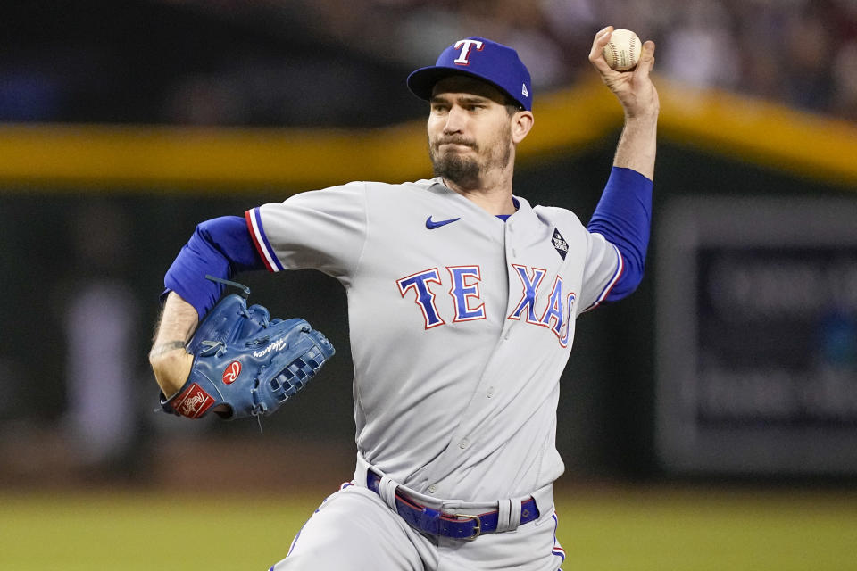 Texas Rangers starting pitcher Andrew Heaney throws against the Arizona Diamondbacks during the third inning in Game 4 of the baseball World Series Tuesday, Oct. 31, 2023, in Phoenix. (AP Photo/Brynn Anderson)