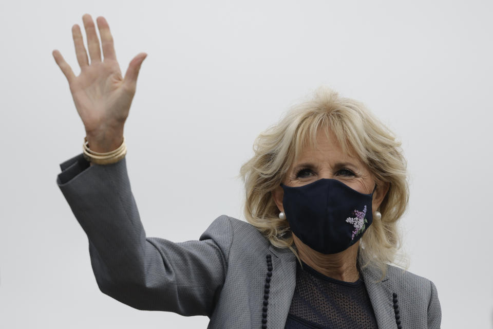 First lady Jill Biden waves as she departs Andrew Air Force Base, Md., Wednesday, May 5, 2021. (Carlos Barria/Pool via AP)