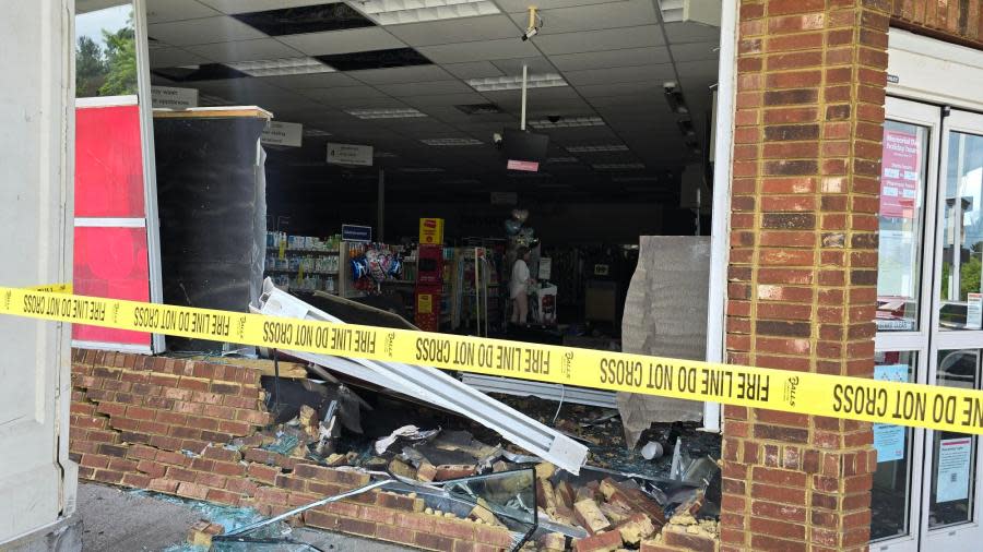 CVS building damaged after SUV crash on Langhorne Road in Lynchburg. (Jemon Haskins/ WFXR News)