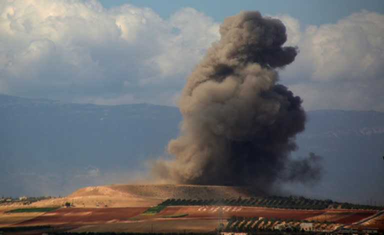 Smoke rises after an air strike near the Idlib province village of Kafr Ain on September 7, 2018 as the presidents of Iran, Russia and Turkey prepared for a summit in Tehran on Syria's last major rebel bastion