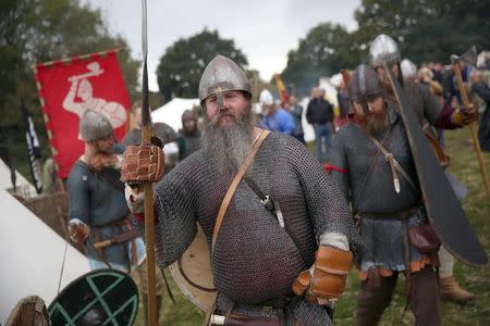 Re-enactors dress in historical costume as part of the Battle of Hastings anniversary commemoration events in Battle, Britain October 15, 2016. REUTERS/Neil Hall