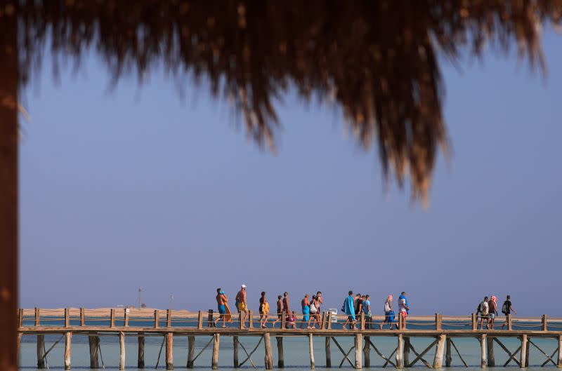 Tourists enjoy a day by the beach during their summer vacation at a Red Sea resort, amid the coronavirus disease (COVID-19) outbreak, in Hurghada