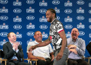 Los Angeles Clippers President of Basketball Operations Lawrence Frank, left, head coach Doc Rivers, second left, and team chairman Steve Ballmer, right, introduce Kawhi Leonard during a press conference in Los Angeles, Wednesday, July 24, 2019. Nearly three weeks after the native Southern California superstars shook up the NBA by teaming up with the Los Angeles Clippers, the dynamic duo makes its first public appearance. (AP Photo/Ringo H.W. Chiu)