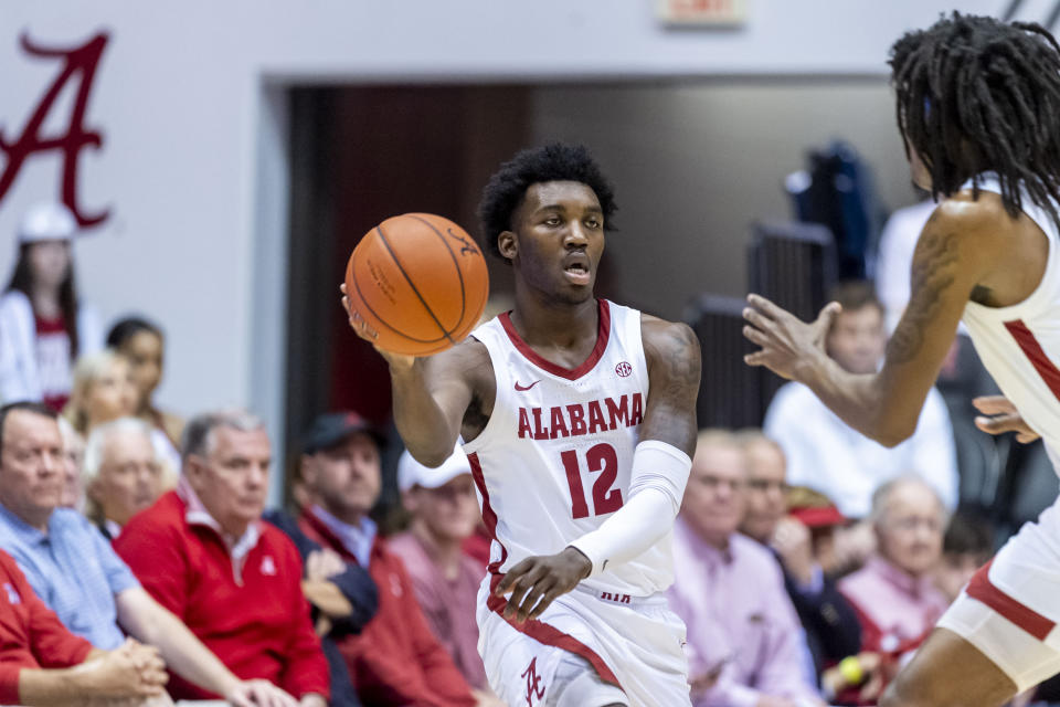 Alabama guard Jaylen Forbes (12) passes the ball during the first half of an NCAA college basketball game against Auburn, Wednesday, Jan. 15, 2020, in Tuscaloosa, Ala. (AP Photo/Vasha Hunt)