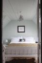 <p> We asked Patrick O’Donnell, brand ambassador at Farrow & Ball for his advice on how to make a small bedroom look bigger. </p> <p> ‘I would keep your bedroom colour ideas light and airy, and try to avoid too many contrasts by using one color for all surfaces – even the ceiling and built-in wardrobes. This is where soft, light colors work best, so go for a soft, nuanced white bedroom or delicate pastel shades.’ </p> <p> This is where a shade like Cabbage White (above) comes in; it’s a more subtle shade than a bright white but will have the same space creating effect. It has a hint of blue and will cool down a room that gets a lot of sun, too. </p>