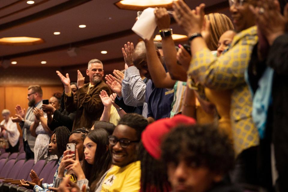 Students and community members react to the Bearcat Advantage scholarship program at W.K. Kellogg Auditorium on Wednesday, May 17, 2023.