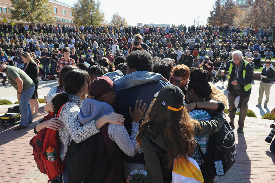 COLUMBIA, MO - NOVEMBER 9: Students embrace one another during a forum on the campus of University of Missouri - Columbia on November 9, 2015 in Columbia, Missouri. Students celebrate the resignation of University of Missouri System President Tim Wolfe amid allegations of racism. (Photo by Michael B. Thomas/Getty Images)