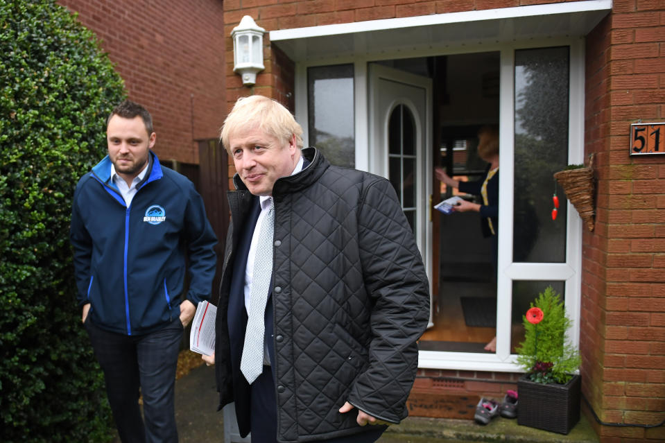 Prime Minister Boris Johnson door knocking in Mansfield, Nottinghamshire, with the party's candidate Ben Bradley while General Election campaigning.