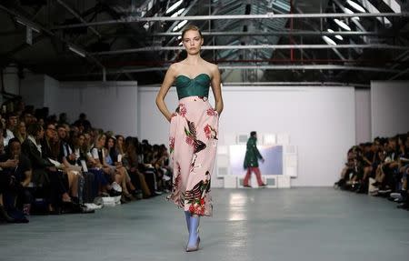 A model presents a creation at the Teatum Jones catwalk show during London Fashion Week Spring/Summer 2017 in London, Britain September 16, 2016. REUTERS/Neil Hall