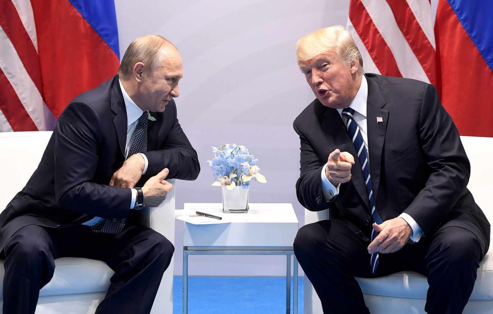 SAUL LOEB/AFP/Getty Donald Trump and Vladimir Putin hold a meeting during the 2017 G20 Summit in Hamburg, Germany