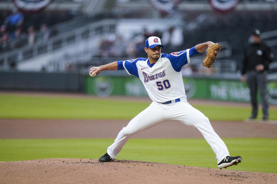 Atlanta Braves starting pitcher Charlie Morton winds up during the first inning of the team's baseball game against the Miami Marlins on Wednesday, April 14, 2021, in Atlanta. (AP Photo/Brynn Anderson)