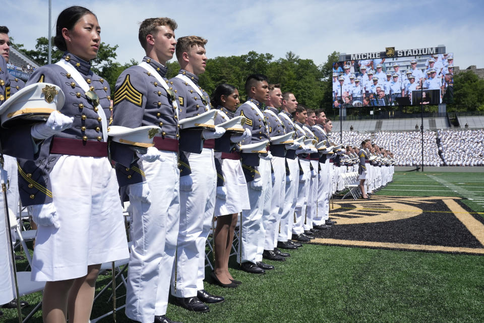 Graduating cadets stand during the singing of "The Corps" after President Joe Biden spoke to graduating cadets at the U.S. Military Academy commencement ceremony, Saturday, May 25, 2024, in West Point, N.Y. (AP Photo/Alex Brandon)