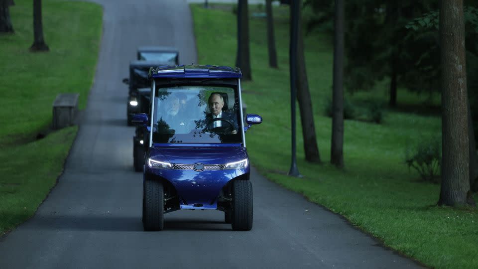 Russian President Vladimir Putin and Indian Prime Minister Narendra Modi ride on a golf cart during an informal meeting at the Novo-Ogaryovo state residence, outside Moscow, on July 8, 2024. - Gavriil Grigorov/Pool/Sputnik/AFP/Getty Images