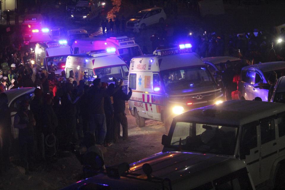 Ambulances drive past carrying workers rescued from the site of an under-construction road tunnel that collapsed in Silkyara in the northern Indian state of Uttarakhand, India, Tuesday, Nov. 28, 2023. India’s transportation minister says all 41 construction workers who were trapped in a collapsed mountain tunnel in the country’s north have been pulled out. (AP Photo)