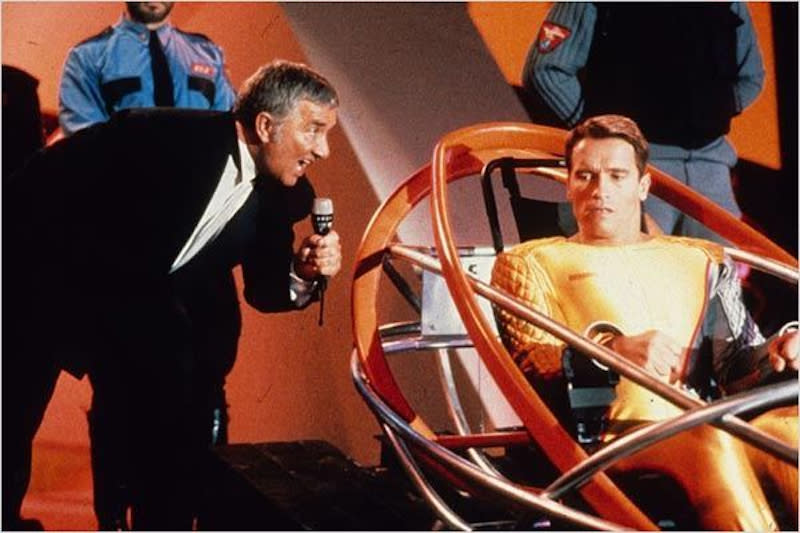 Arnold Schwarzenegger and Richard Dawson in <i>The Running Man</i> (Photo: TriStar Pictures)