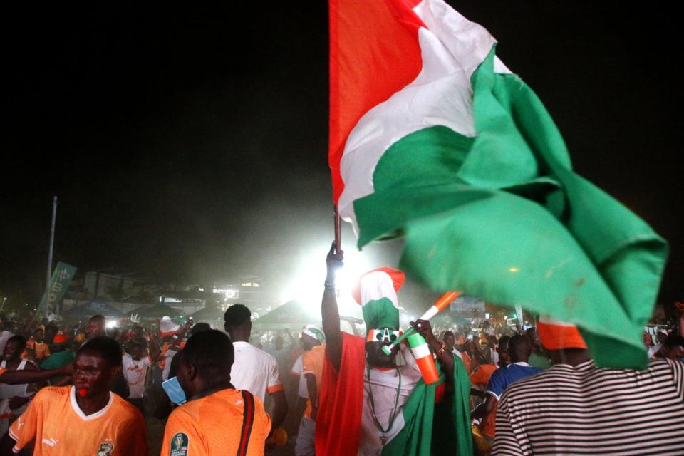 Ivory Coast fans celebrate reaching the semis (EPA)