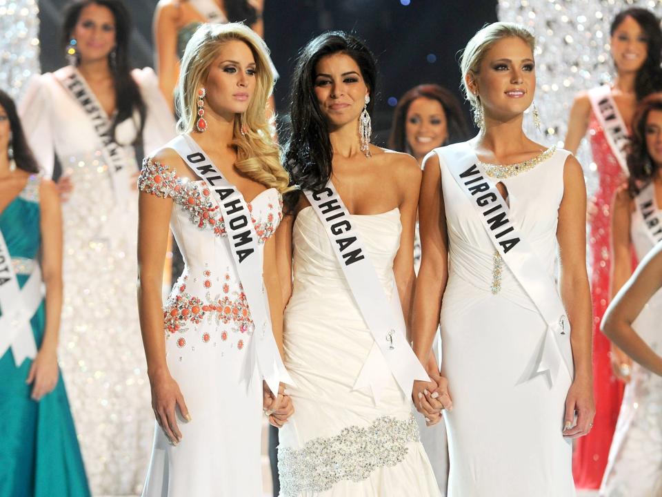 Miss Oklahoma Morgan Elizabeth Woolard, Miss Michigan Rima Fakih and Miss Virginia Samantha Casey wait for the final result at the Miss USA 2010 pageant at Planet Hollywood Casino Resort on May 16, 2010 in Las Vegas, Nevada.