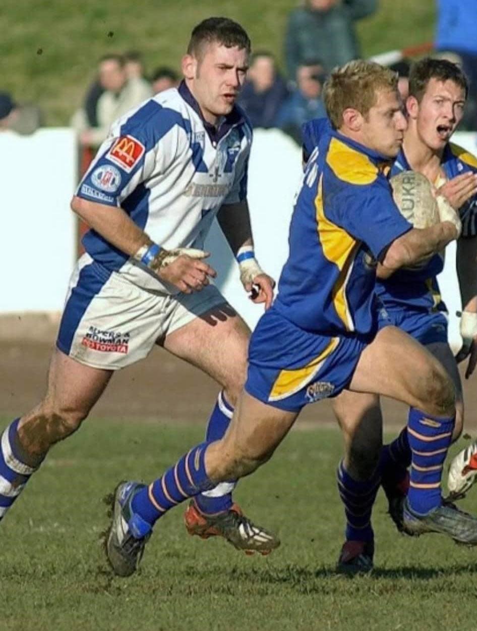 News and Star: Workington Town's James Robinson playing against Rob Burrow in 2004.