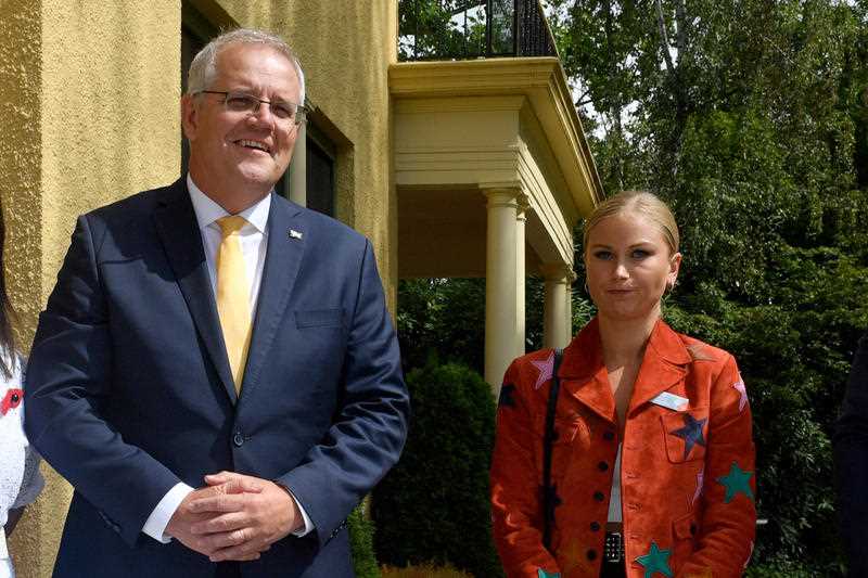 Prime Minister Scott Morrison and 2021 Australian of the Year Grace Tame during a morning tea for state and territory recipients in the 2022 Australian of the Year Awards at The Lodge in Canberra.