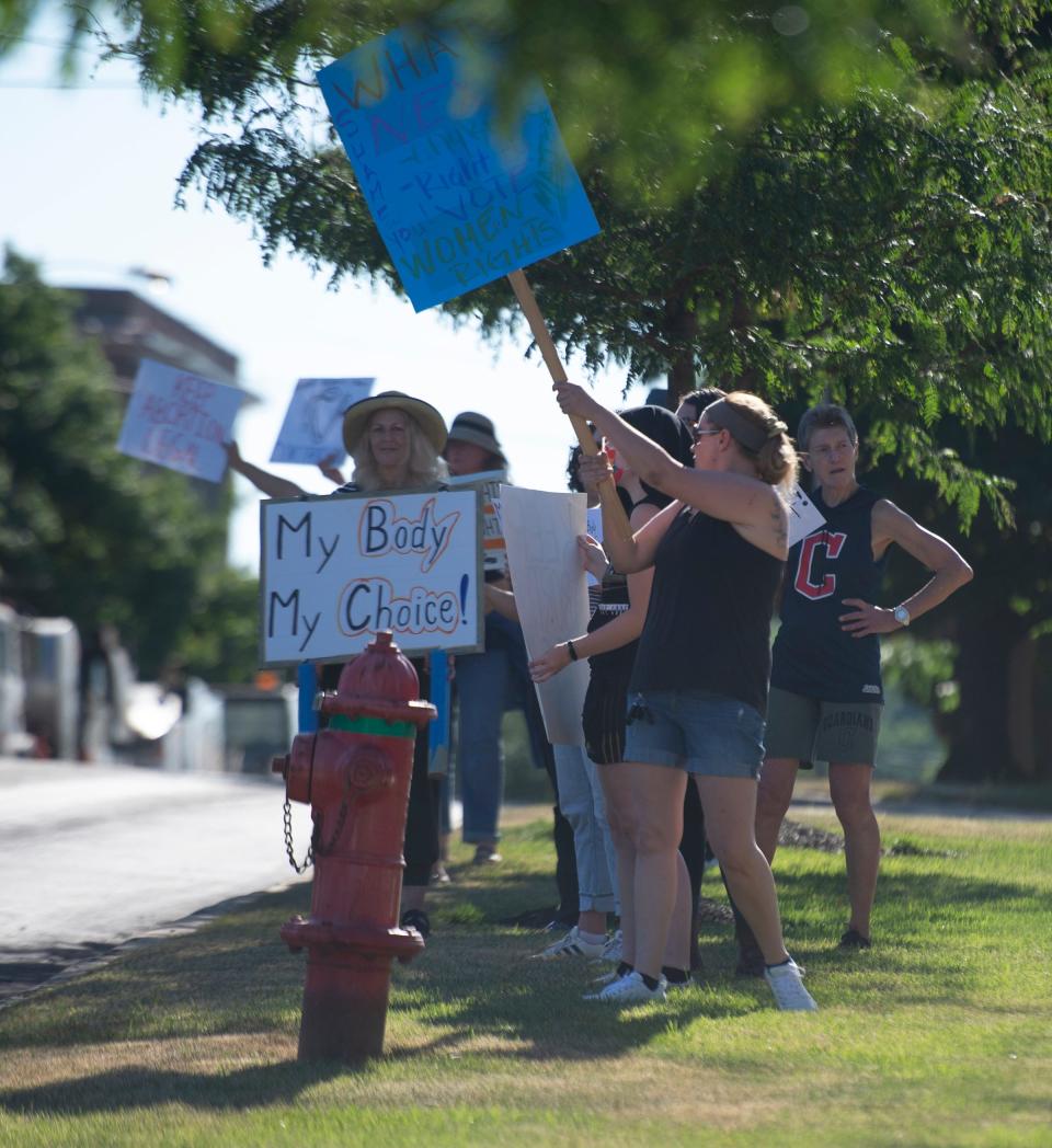 Students for a Democratic Society organized a protest in support of reproductive rights after the Supreme Court decision to overturn Roe v. Wade. Protesters gathered on the sidewalk and steps of the Kent courthouse.