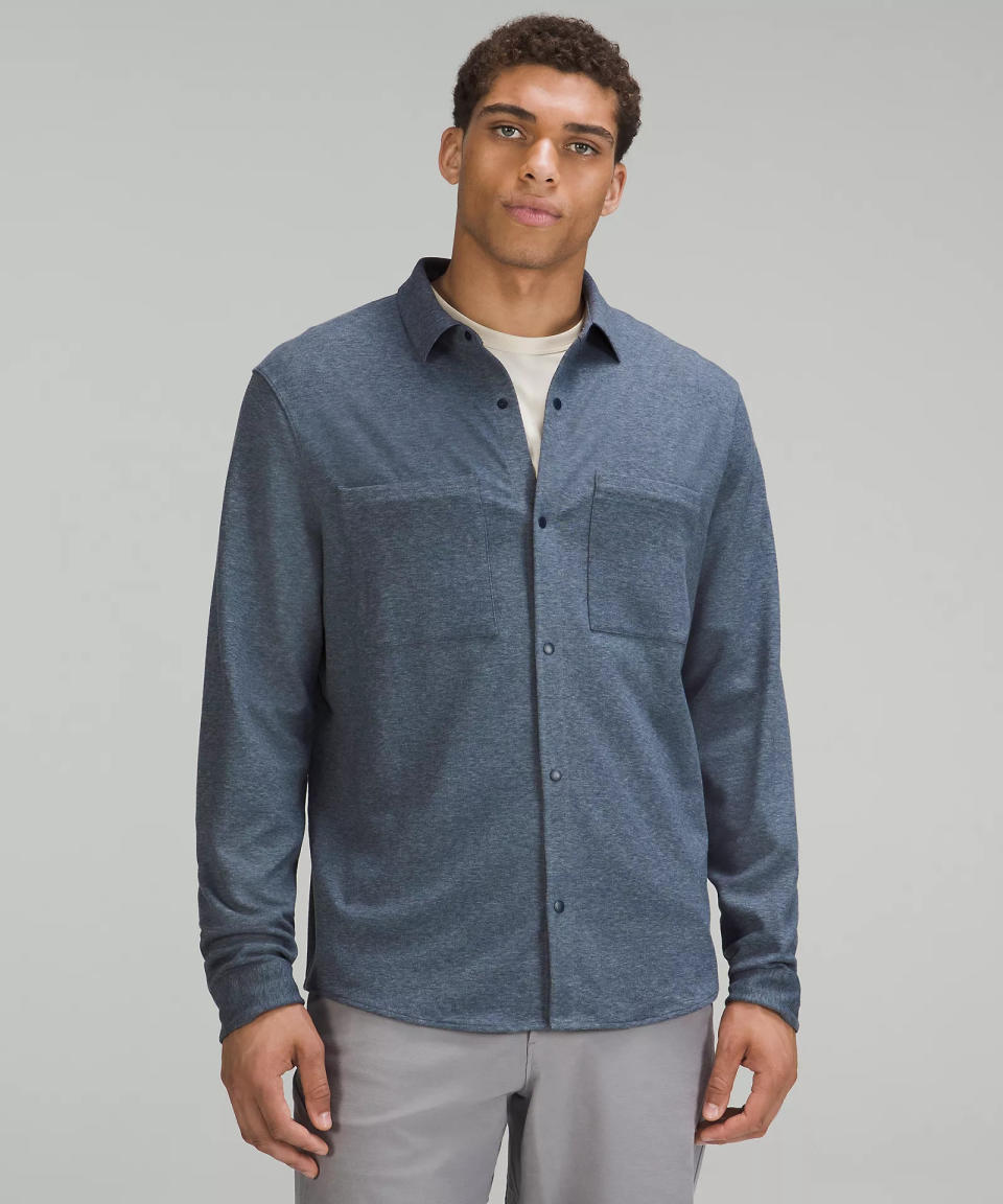 model wears blue Soft Knit Overshirt. Image via lululemon.