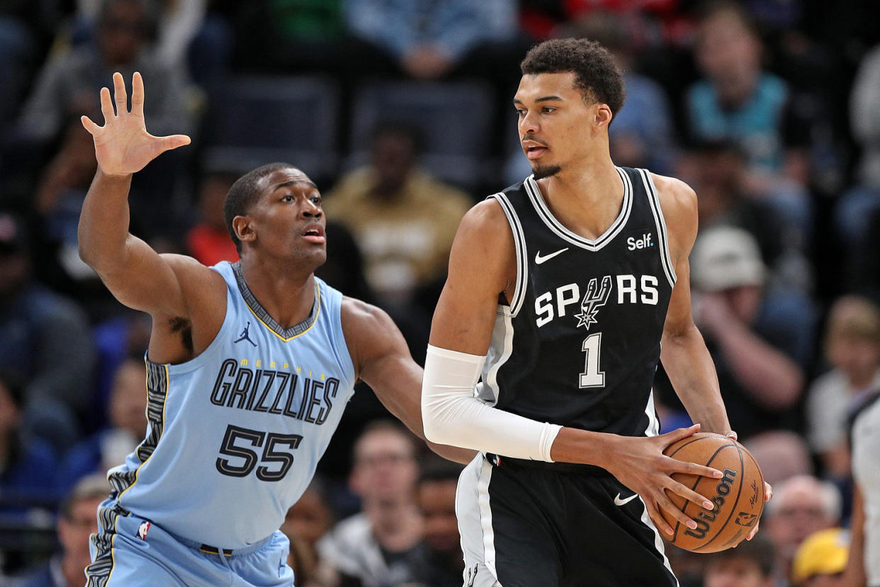 Image: San Antonio Spurs v Memphis Grizzlies game uniform NBC rookie of the year award (Justin Ford / Getty Images file)