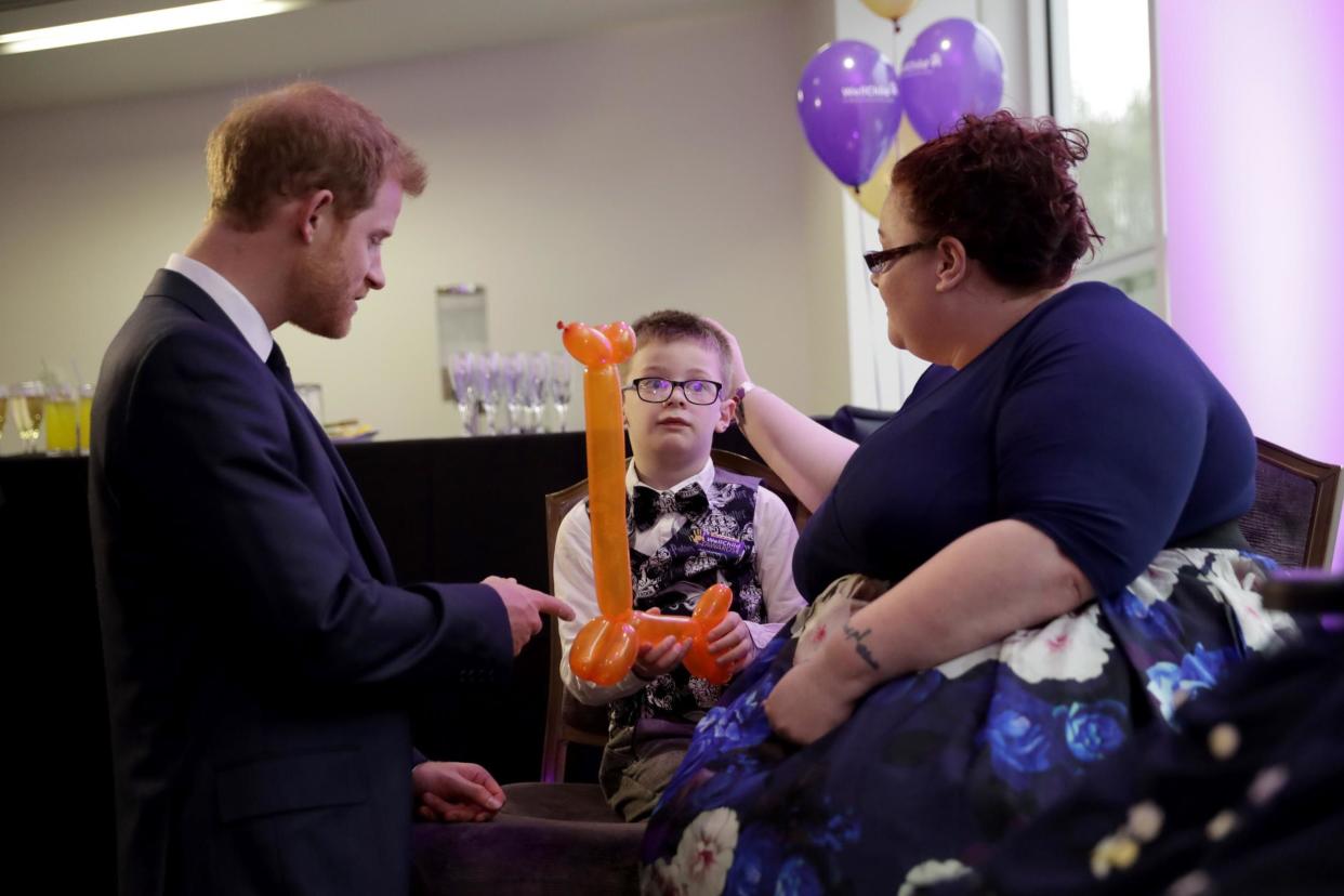 Prince Harry meets Finley Green, aged seven, winner of the Inspirational Child Award aged 4-6: Getty Images