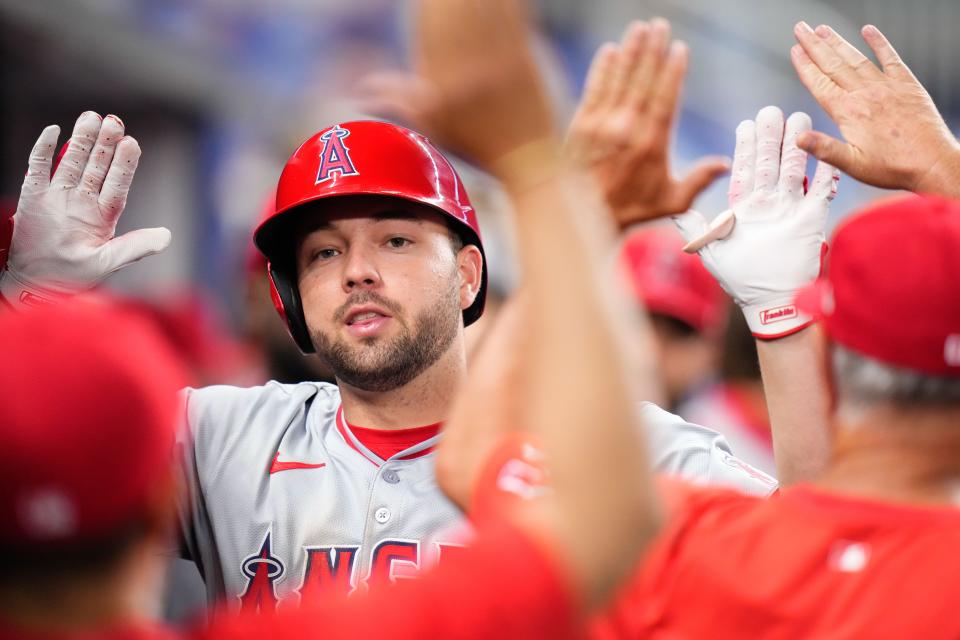 Los Angeles Angels first baseman Nolan Schanuel (18) celebrates with teammates in the dugout after hitting a home run against the Miami Marlins during the fifth inning at loanDepot Park.