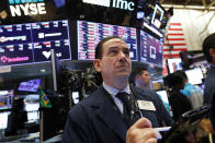 Trader Tommy Kalikas works on the floor of the New York Stock Exchange, Thursday, Dec. 6, 2018. U.S. stocks tumbled in early trading Thursday following a sell-off in overseas markets. (AP Photo/Richard Drew)