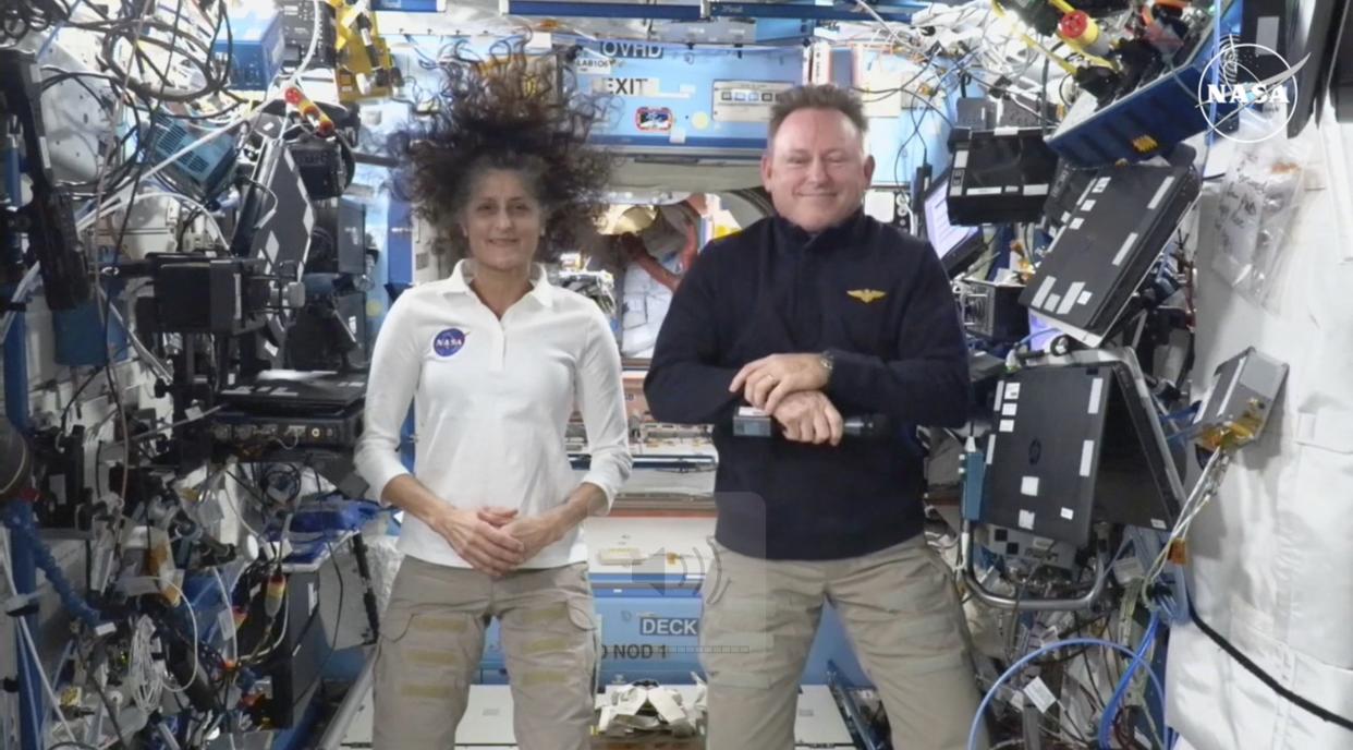 This image made from a NASA live stream shows NASA astronauts Suni Williams and Butch Wilmore during a press conference from the International Space Station on Friday.