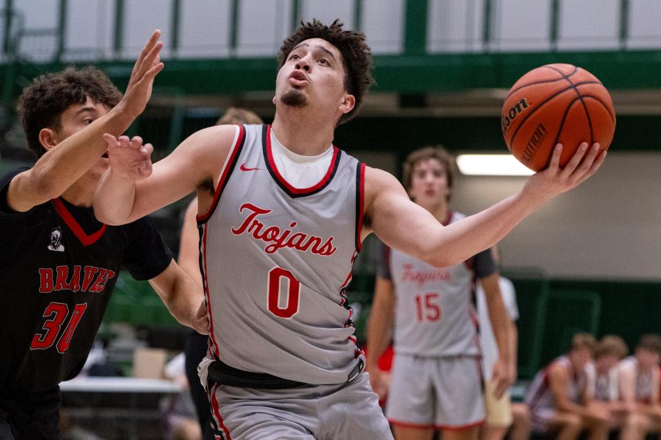 Center Grove High School's Jalen Bundy (0) shoots during Charlie Hughes Shootout basketball action, Saturday, June 24, 2023, at Westfield High School.